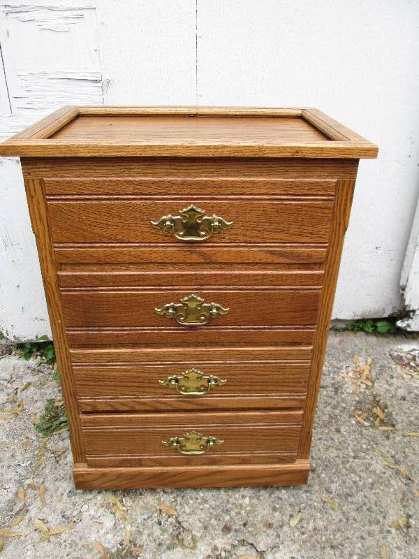 Solid wood stand with drawers.  Top...