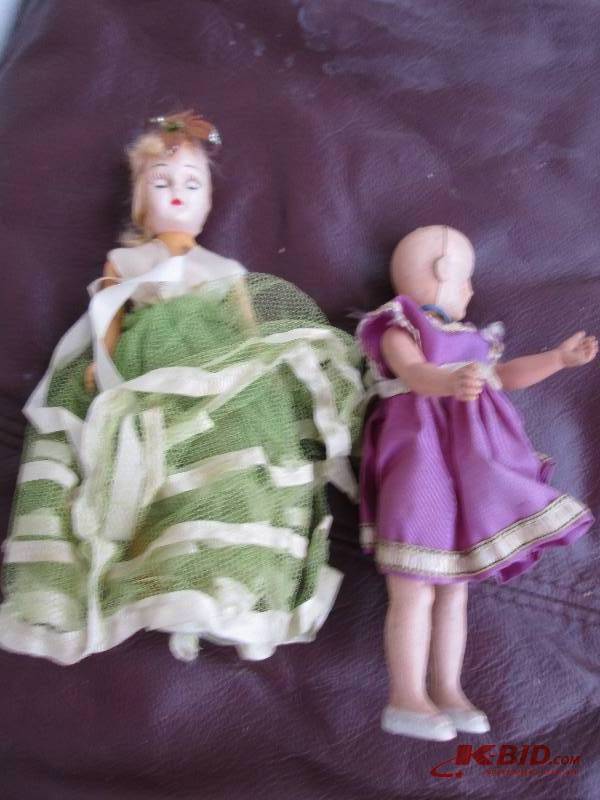 2 vintage dolls with fancy dresses,...
