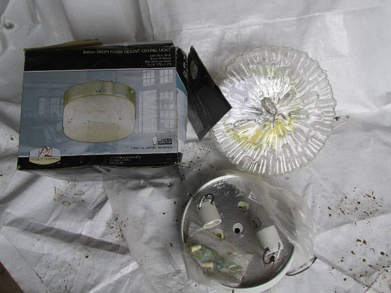 3 light fixtures, one has no globe...