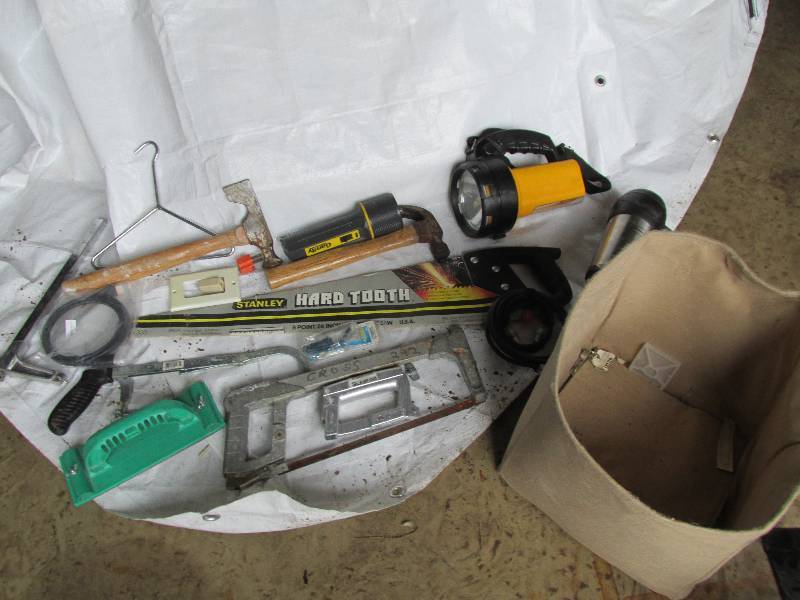 Lot of assorted hand tools in a clo...