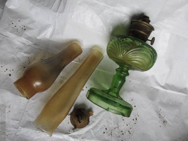 Vintage green glass oil lamp with e...
