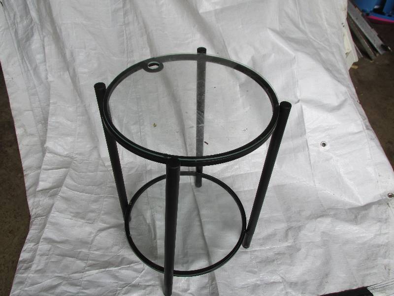 Round glass top stand with cord hol...
