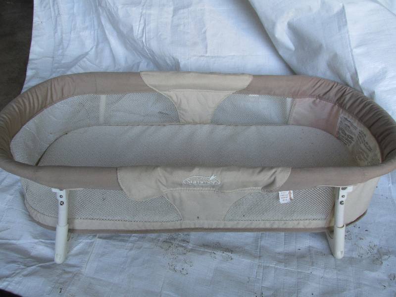 Folding baby bed and child gate...