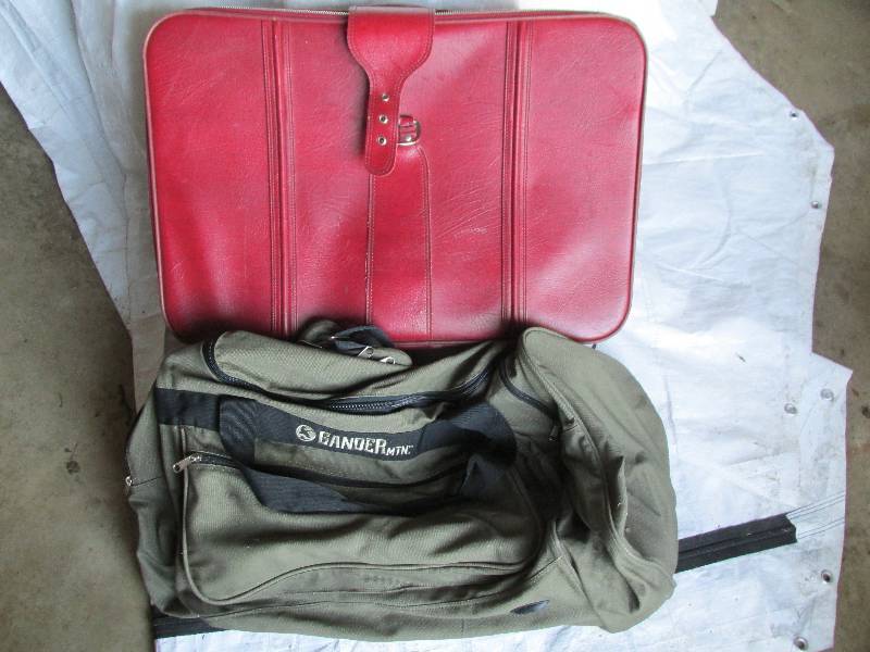 Suitcase and Gander Mountain duffel...