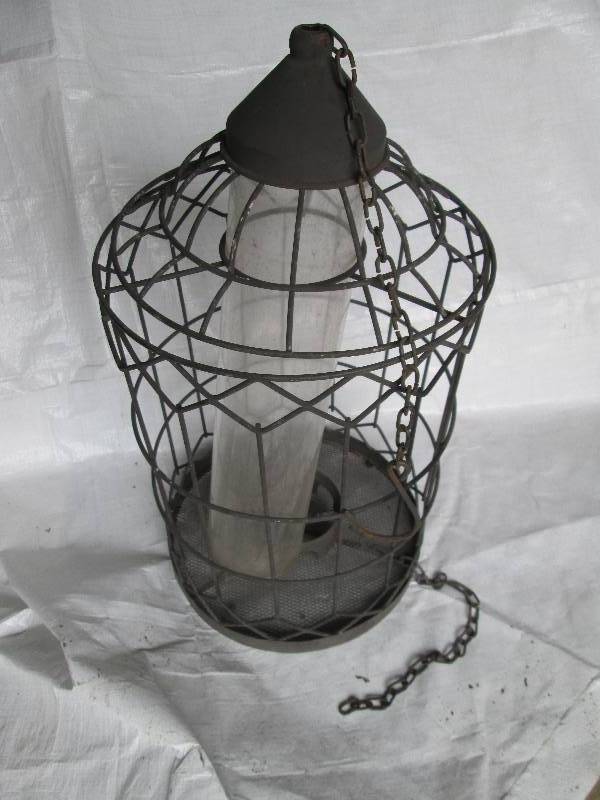 Metal framed bird feeder, keeps squ...