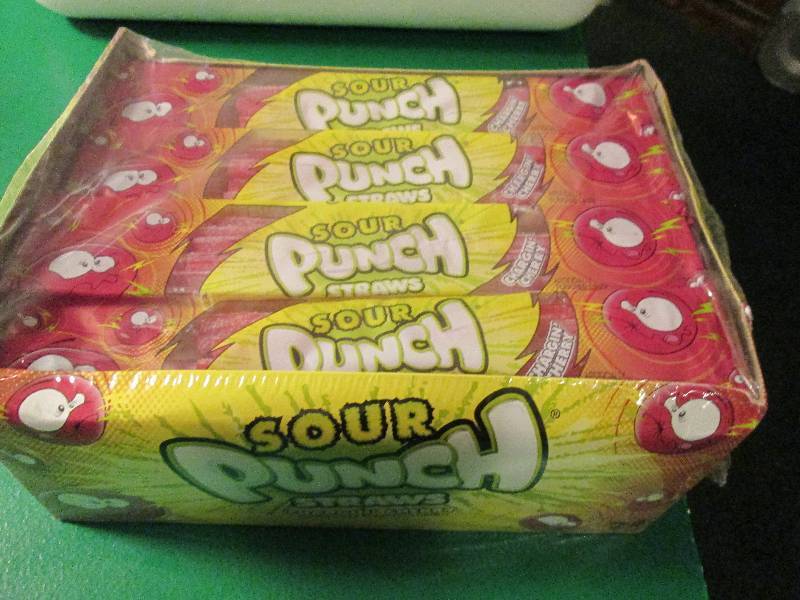 Unopened box of sour punch straws...