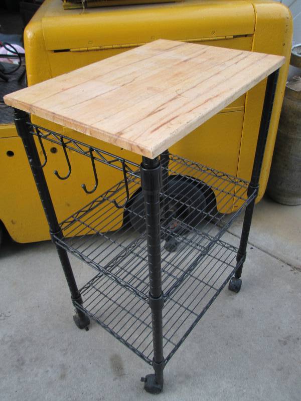 metal frame, wood topped shelf on c...