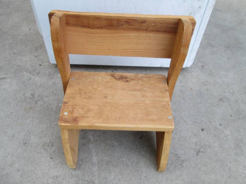 Doll size folding chair made of sol...