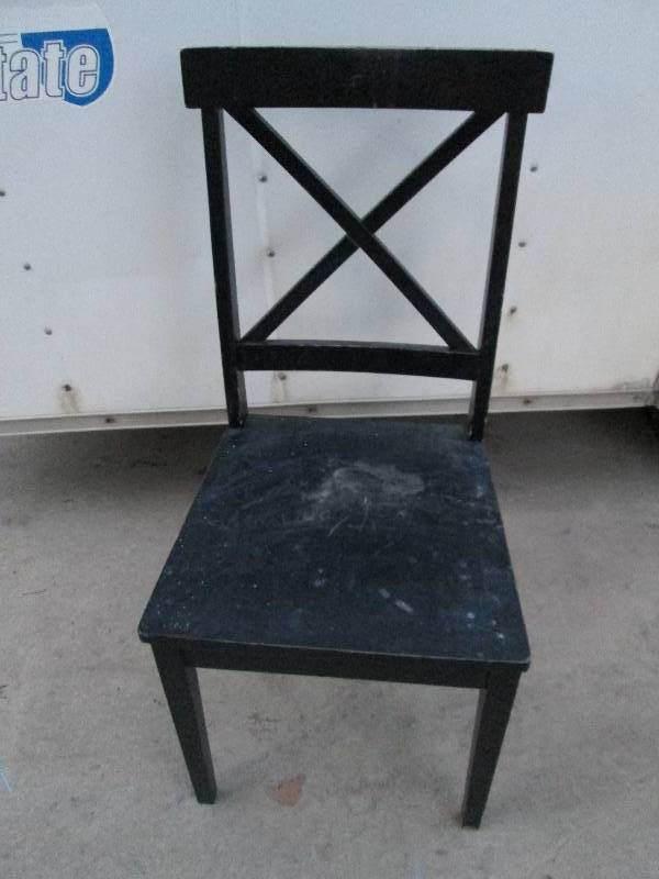 Black distressed finish wood chair...