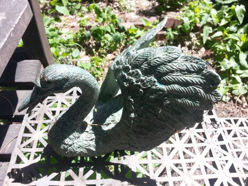 lot 117 image: Lot of (3) Garden Dcor Pieces, Heart Sun Face, Swan, Etc.