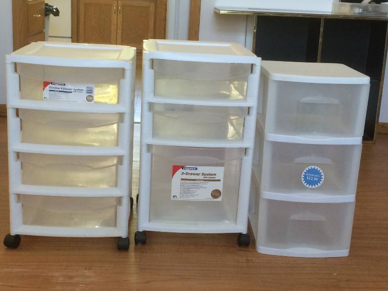 lot 76 image: Three Plastic Storage Bins