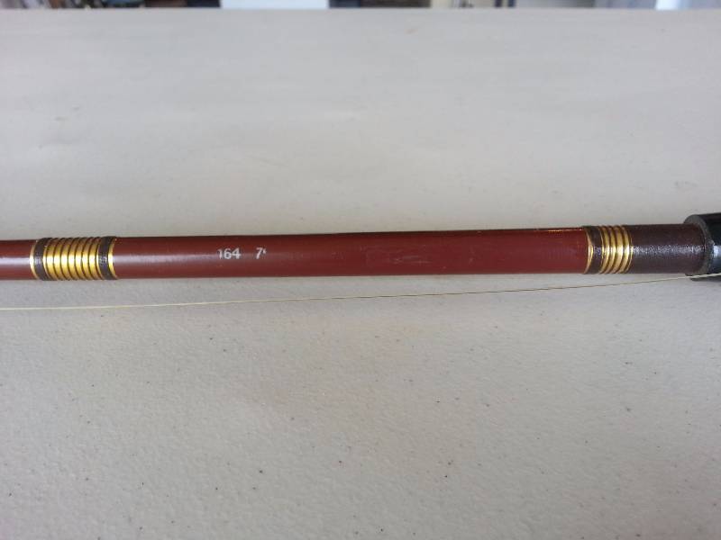 lot 110 image: Vintage Ambassadeur Mag II Baitcasting Reel & Vintage Rod (St. Croix stamped 164 7)