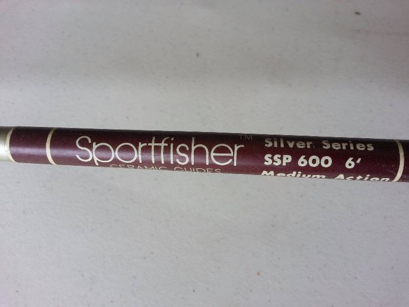 lot 115 image: Vintage Sportfisher Silver Series SSP 600  w Ryobi SX1 Spinning Reel
