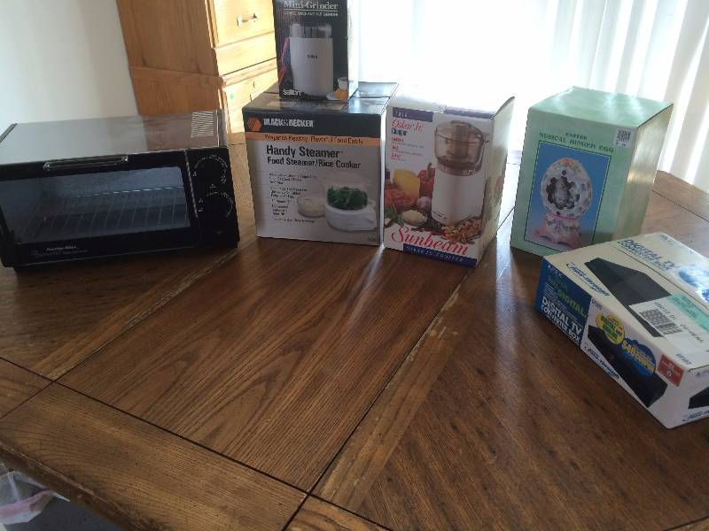 lot 212 image: New Proctor Silex Toaster Oven, New Food SteamerRice Cooker, New Mini CoffeeSpice Grinder, Chopper and More