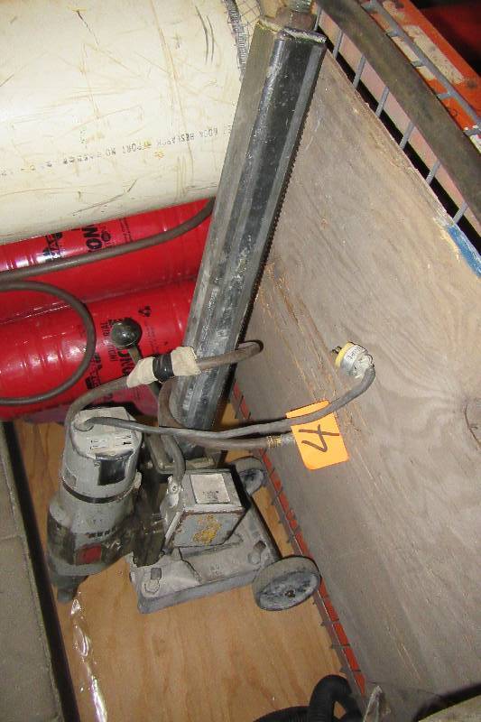 Heavy Duty Cement DrillAuger with various size bits.. Diamond edged.  Works well.