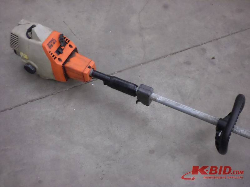 lot 21 image: Stihl FS44 Gas-Powered Trimmer ...