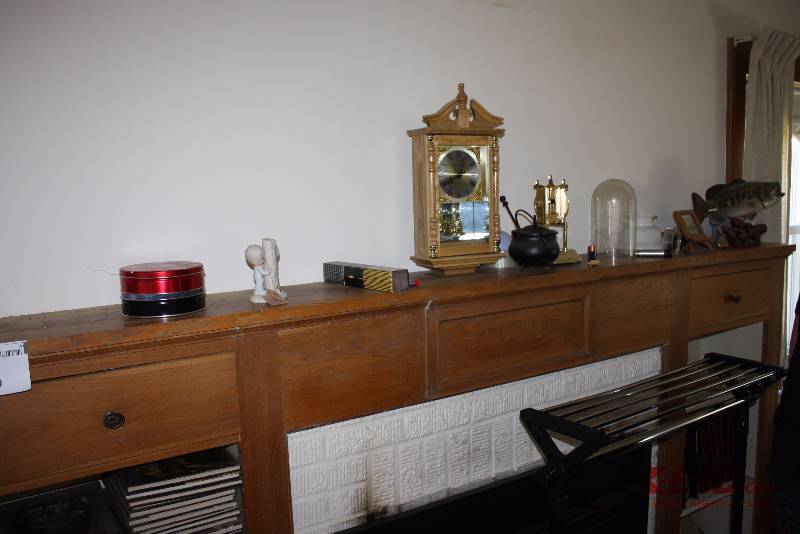 Shelf Lot Including Ornamental Clock Kettle Match Box And More.