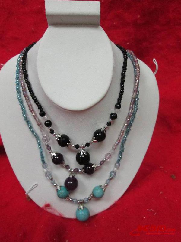 3- Necklaces purple, black, and tur...