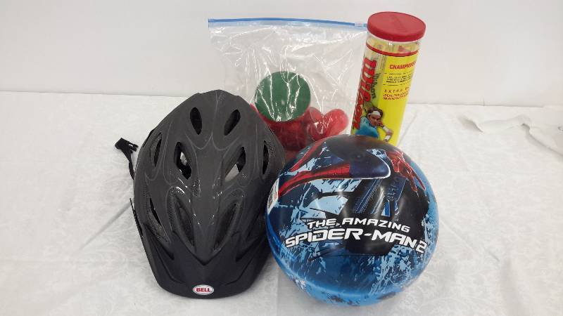 lot 11 image: helmet, tennis balls, spiderman II ball, air hockey parts