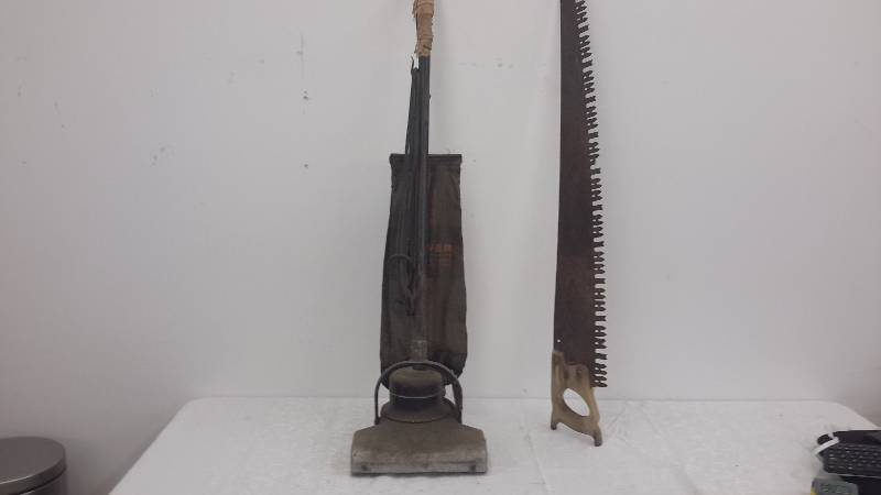 lot 67 image: antique hoover, saw