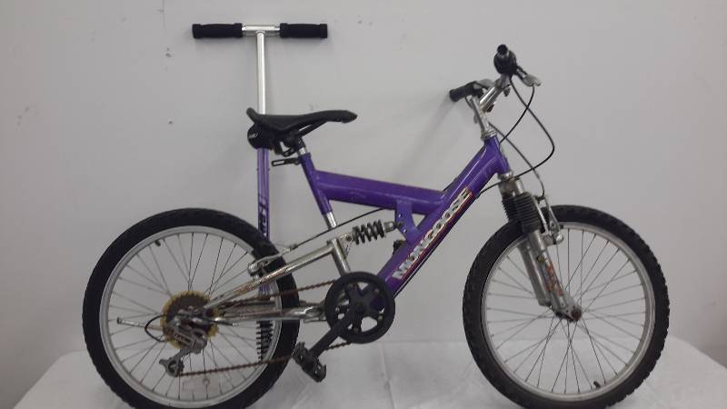 lot 76 image: bike, pogo stick