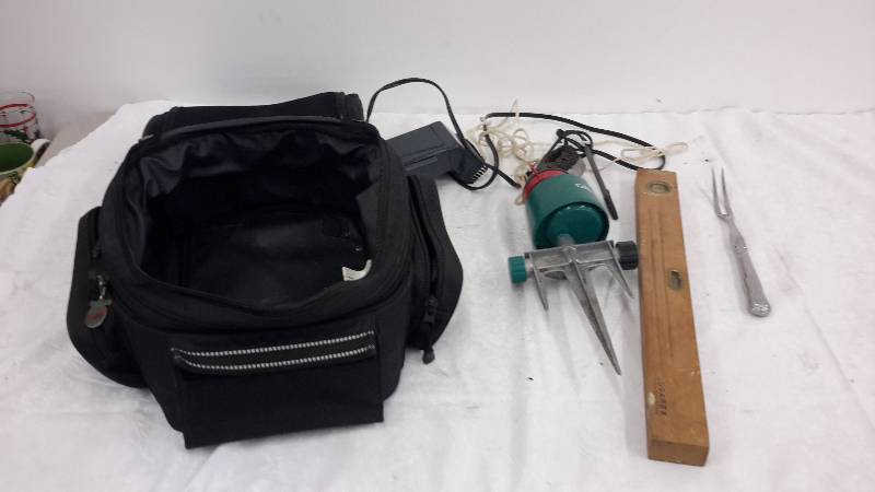 lot 28 image: bag, sprinkler, level, misc