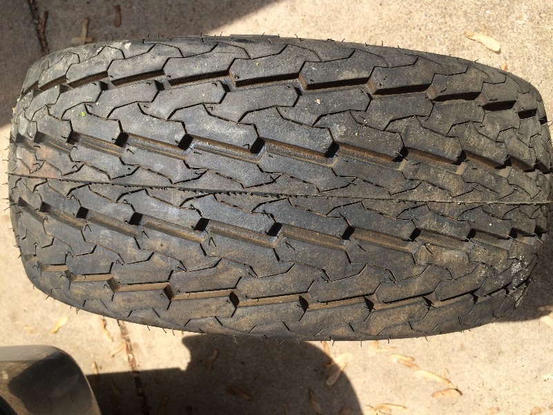 lot 69 image: Trailer Tire & Wheel 20.5 x 8.0 - 10   Like New - has never been used  100% full tread