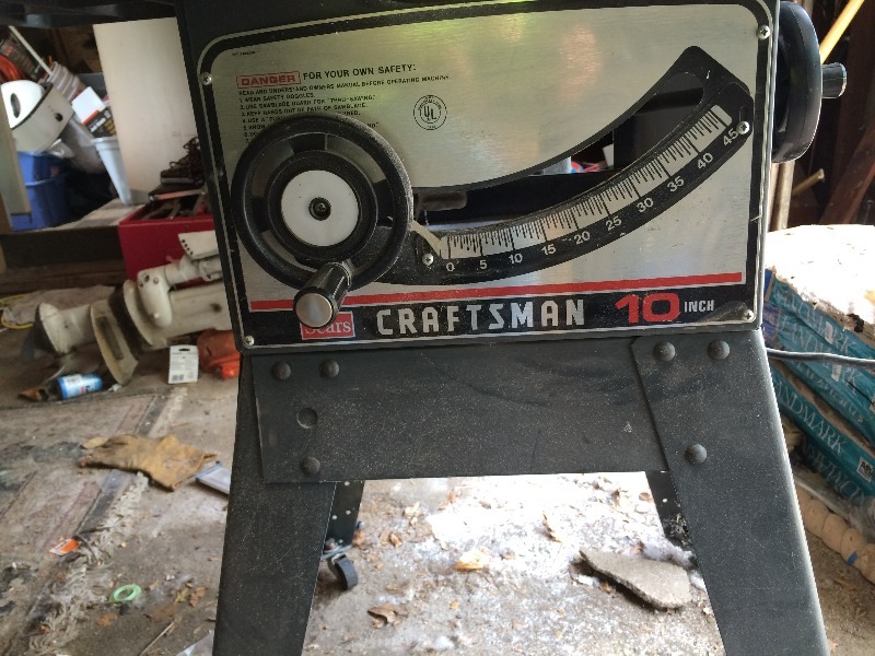 lot 80 image: Craftsman 10 Table Saw, stand and some accsesories - looks to be in very good shape  works