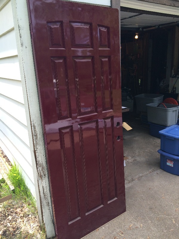 lot 119 image: Fiberglass Door and wood door frame - New,  door was professionally spray painted