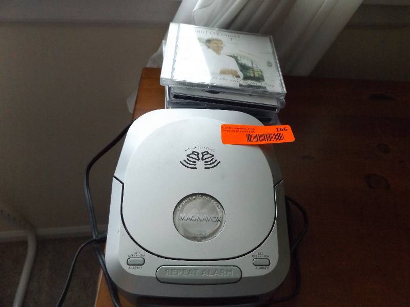 lot 166 image: Magnavox Clock Radio and CDs