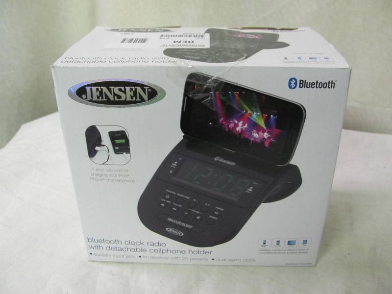 lot 16 image: Jensen Bluetooth Clock Radio with Cellphone Holder