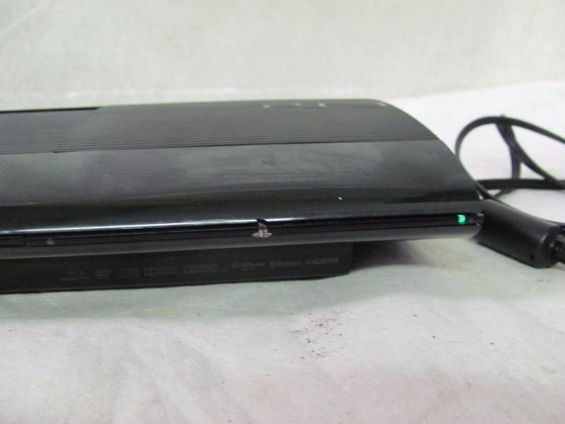 lot 25 image: PS3 12GB Console