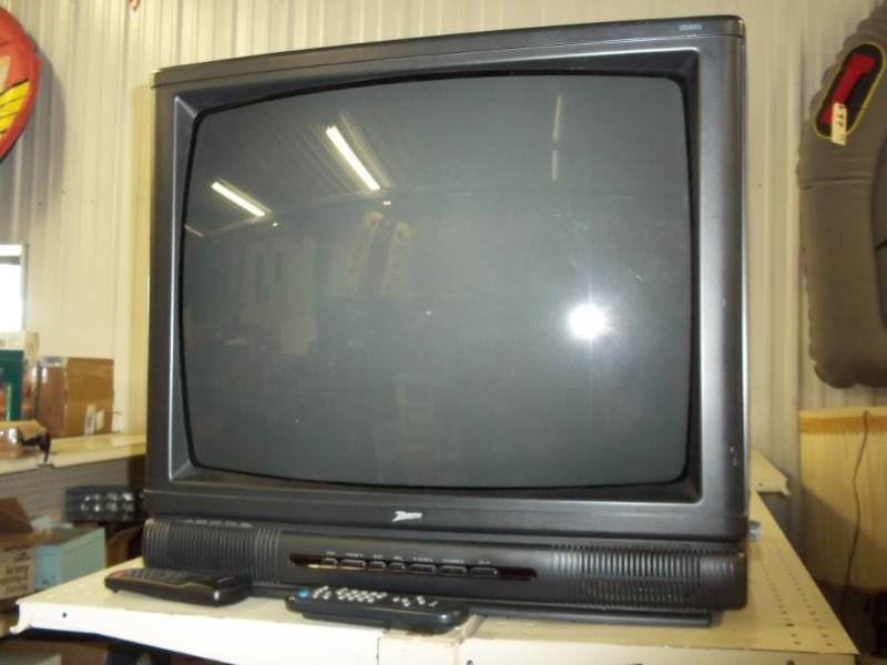 lot 100 image: 25 TV with remote