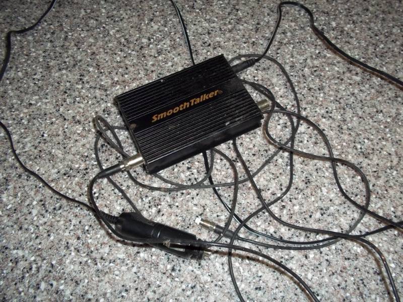 lot 108 image: Smooth Talker Cell phone booster