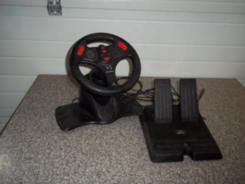 lot 110 image: Play Station one V3 Steering wheel