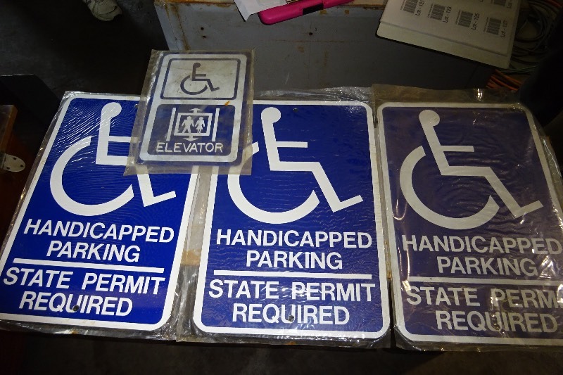 lot 134 image: 3 Aluminum handicap signs
