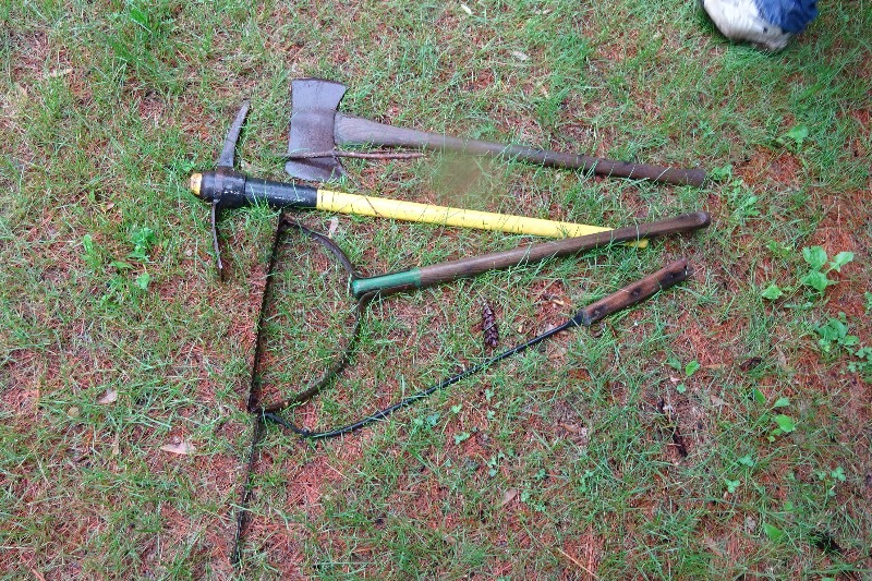 lot 216 image: 1 pick, 1 axe, 2 weed whackers