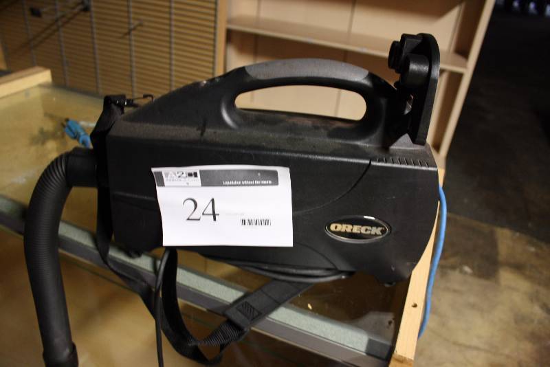 lot 24 image: Oreck XL Hand Vacuum wCord SN 1000DBXT36141.