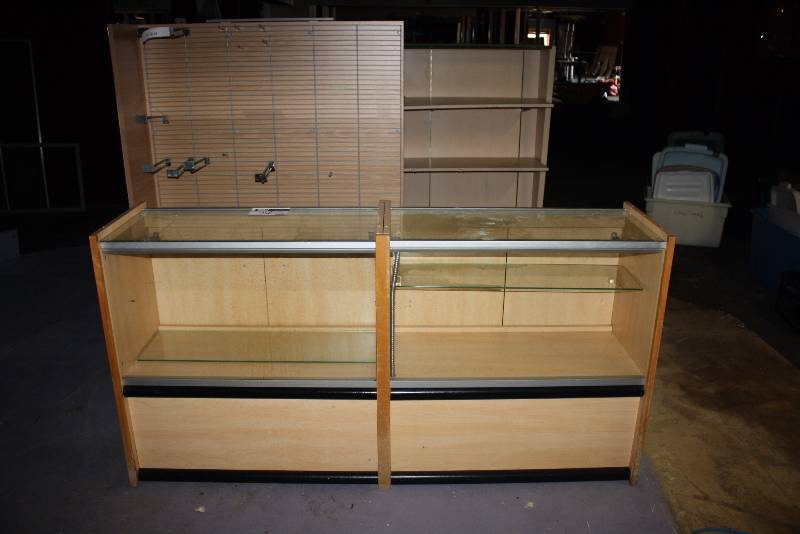 lot 29 image: Lot of (2) Including Wooden Display Shelf Wooden Display wWheels, Glass Windows & Cupboards 72.5 x 18 x 37.5, 24 x 55 x 63.