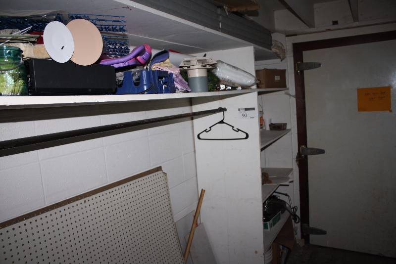 lot 90 image: Shelf Lot Including Basket of Markers Straps Fan wStand & Wire Grate Encasement And More Does Not include Shelves.