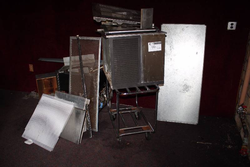 lot 99 image: Corner Lot Including Metal Mesh wEncasement Metal Cart wWheels Miscellaneous Grate And More.
