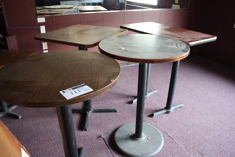 lot 111 image: Lot of (4) Wood Style Tables wMetal Stands Including Circular Table Tops (2) Square Table Tops (2). 30 x 30 x 41 (3), 24 x 42 x 41.