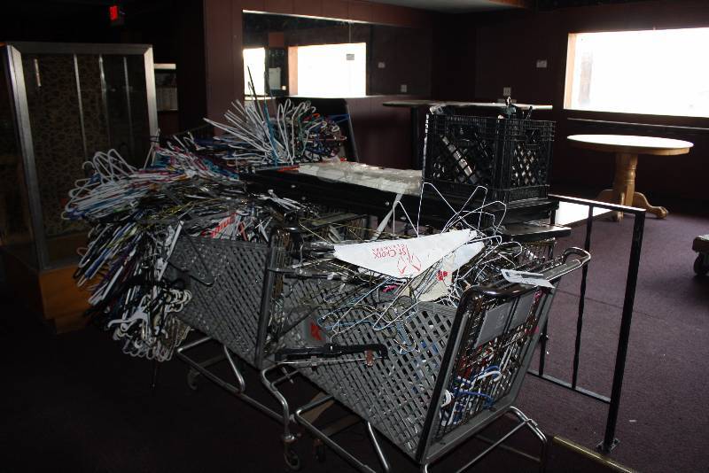 lot 113 image: Lot of (3) Including Grocery Carts (2) Coat Hangers.