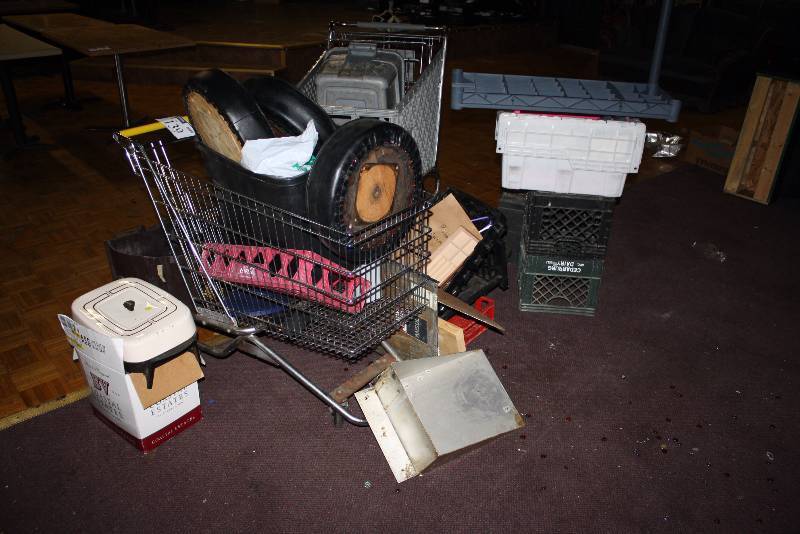lot 139 image: Floor Lot Including Grocery Cart Bar Seat Top Plastic Totes wLids And More.