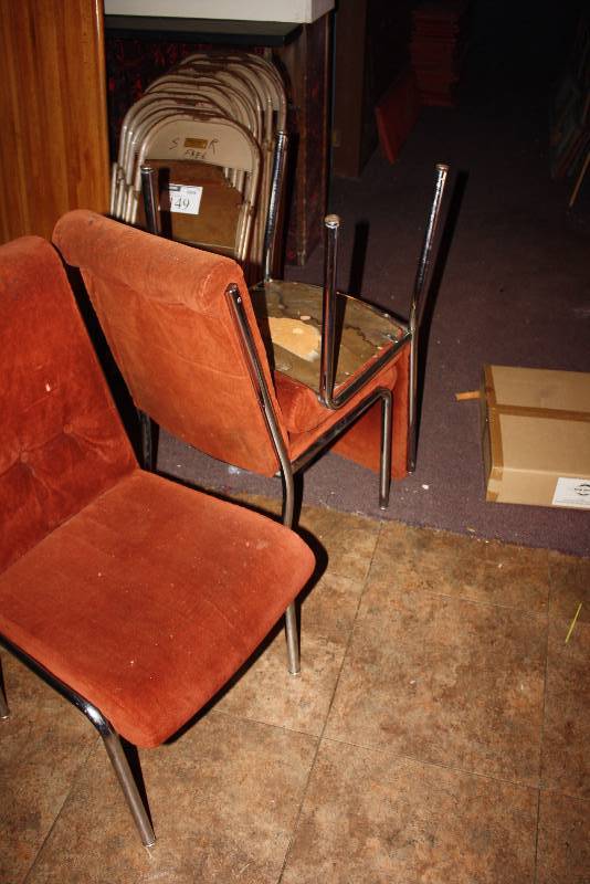 lot 149 image: Lot of (17) Chairs Including Metal Folding Chairs, Brown (14) Orange Upholstered Chairs (3).