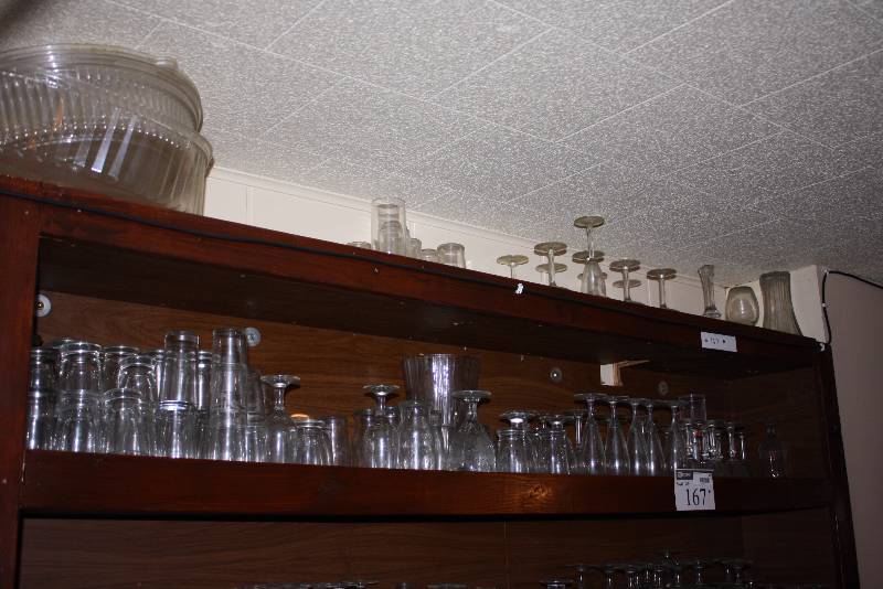 lot 167 image: Shelf Lot of Glassware Including Lowball Glasses Cocktail Glasses And More.