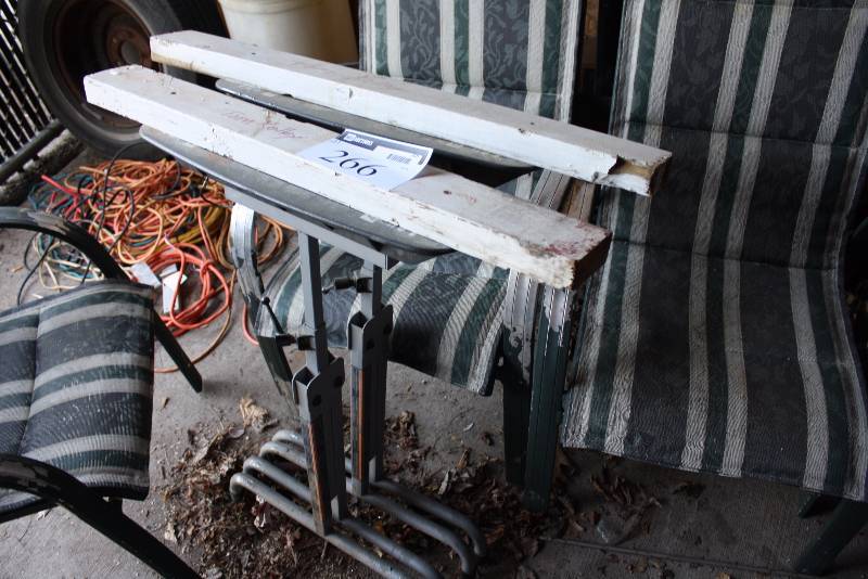 lot 266 image: Lot of (2) Green Metal Stands For Patio Table.