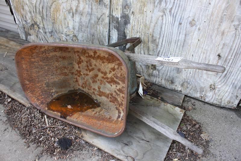 lot 290 image: Metal Wheel Barrow wWooden Handles.