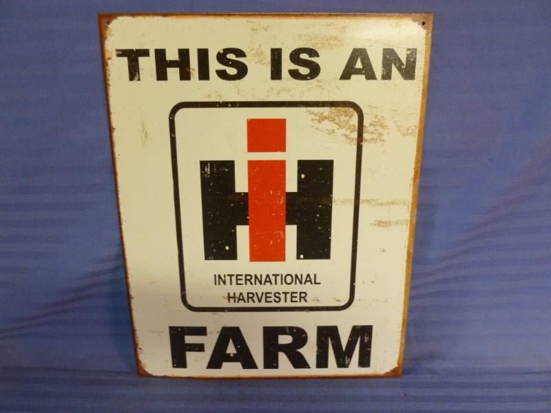 lot 41 image: Collectible Metal Sign
