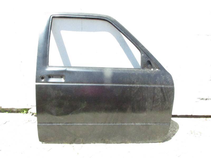 Brand new car door, primed, no rust...